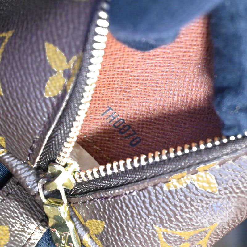 Louis Vuitton Monogram Trousse Demi Ronde