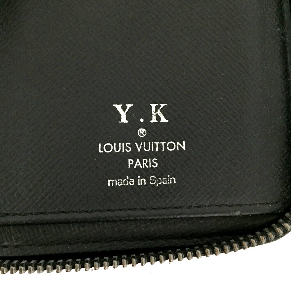 LOUIS VUITTON Monogram Eclipse Vertical Zippy Wallet