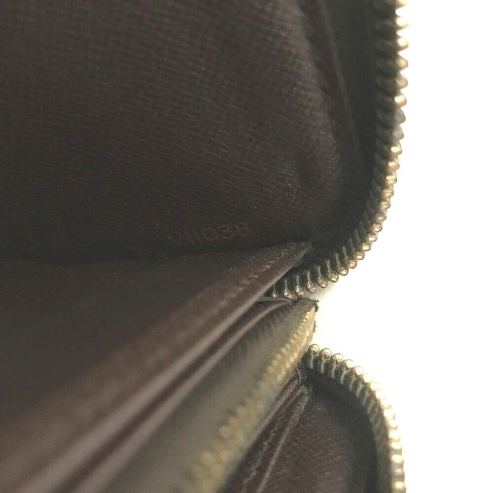 LOUIS VUITTON Damier Ebene Zippy Wallet VI1038