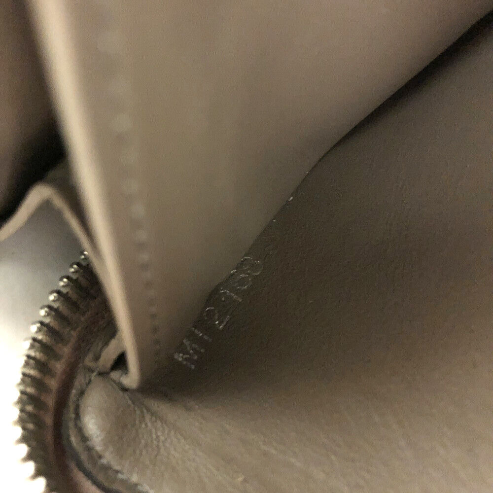 LOUIS VUITTON Parnacea Portefeuille Comet L-shaped zipper long wallet Magnolia MI2168