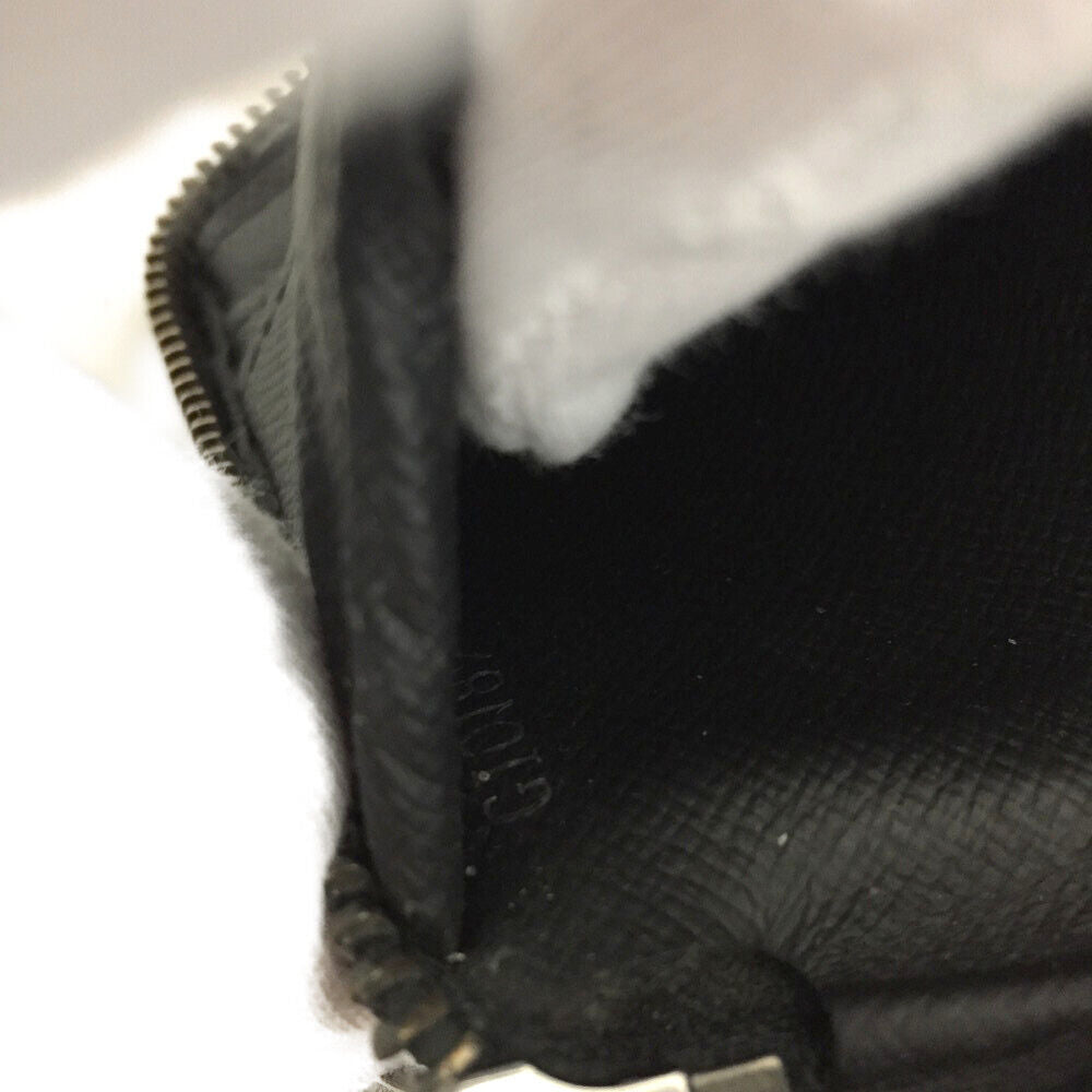 LOUIS VUITTON Monogram Eclipse Vertical Zippy Wallet GI0189