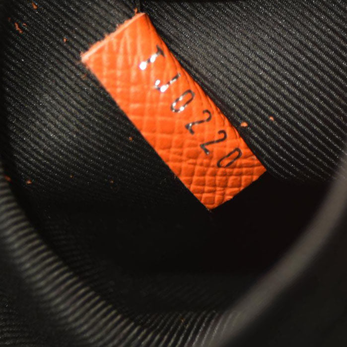 LOUIS VUITTON Taiga Monogram Discovery Backpack PM Orange