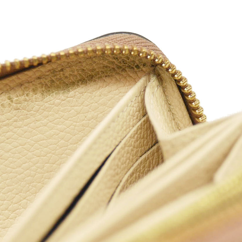 LOUIS VUITTON Empreinte Monogram Giant Zippy Wallet Creme Bois De Rose