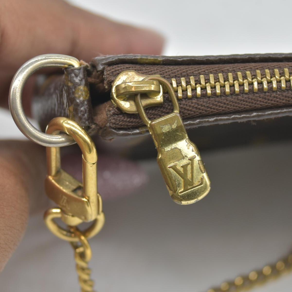 $810 Louis Vuitton Monogram Mini Pochette Accessories DU1006 2006