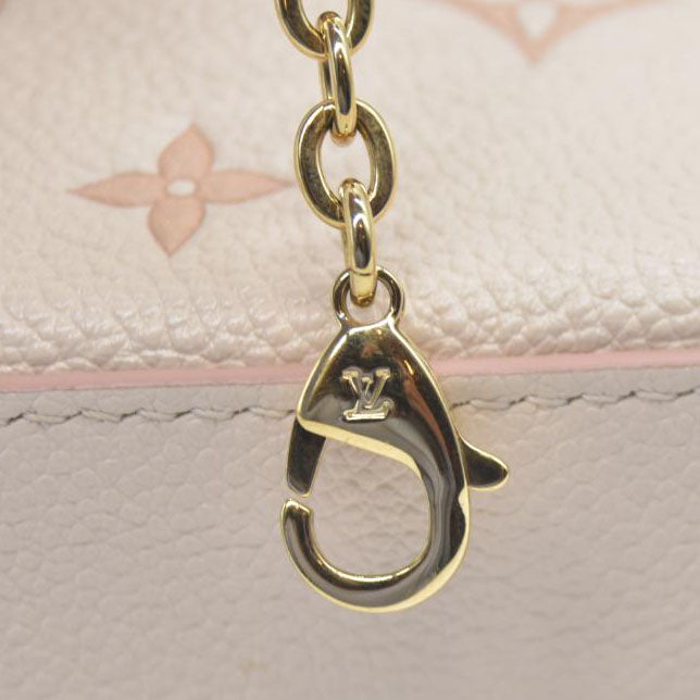 $1990 Louis Vuitton House's signature Monogram Pochette Félicie Bicolor Eden