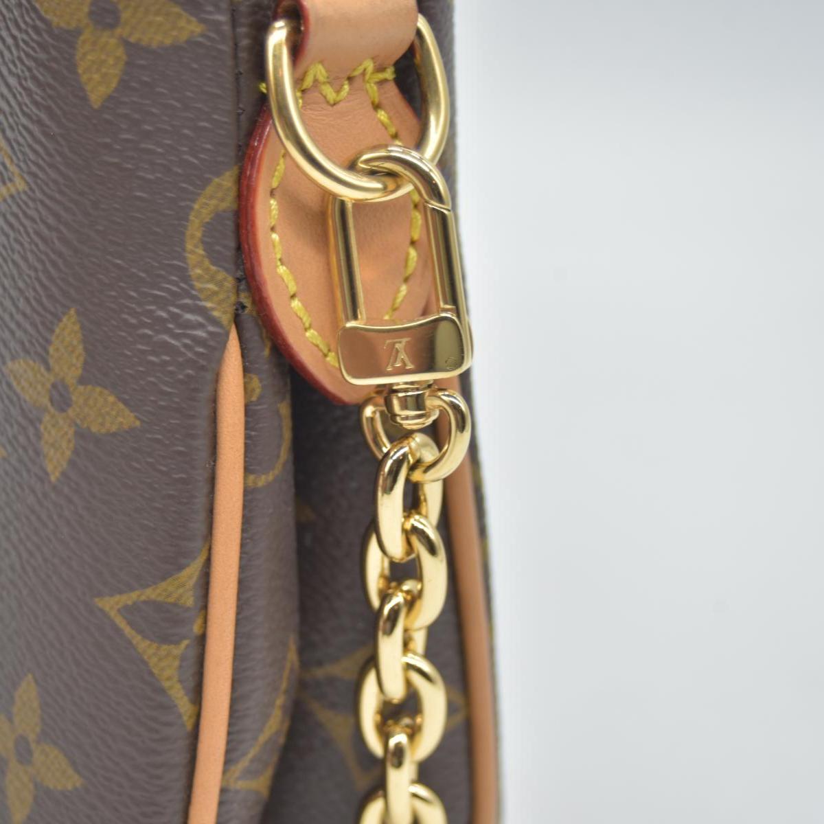 $1,950 LOUIS VUITTON Monogram Liv Pochette