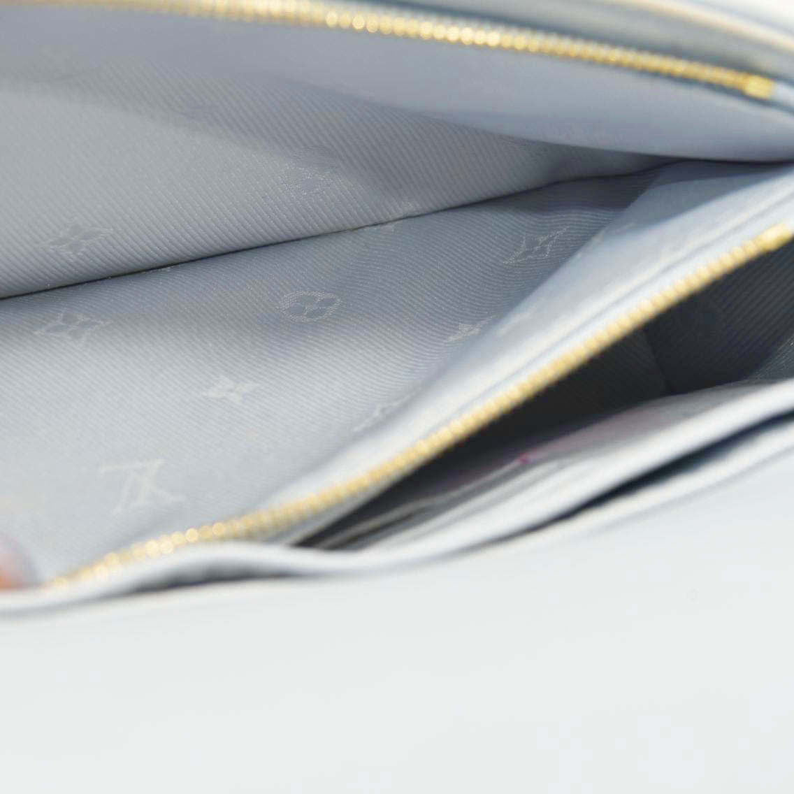 LOUIS VUITTON Calfskin Bubblegram Wallet On Strap Ice Blue