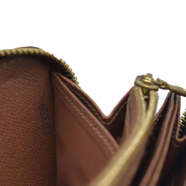 AUCTION $915 Louis Vuitton Monogram Zippy Wallet CA5039