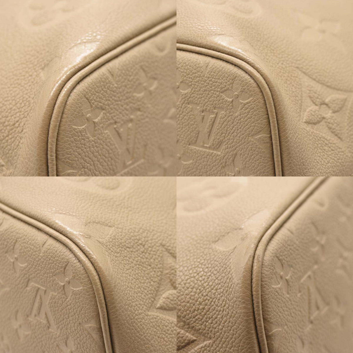 USED LOUIS VUITTON Empreinte Monogram Giant Neverfull MM Tourterelle