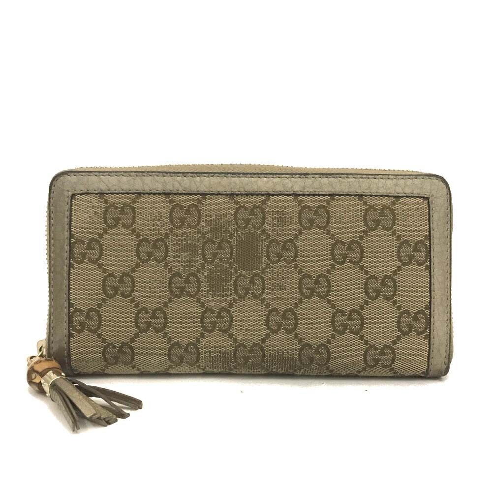 Gucci  Monogram Bamboo Tassel Zip Around Wallet Gold