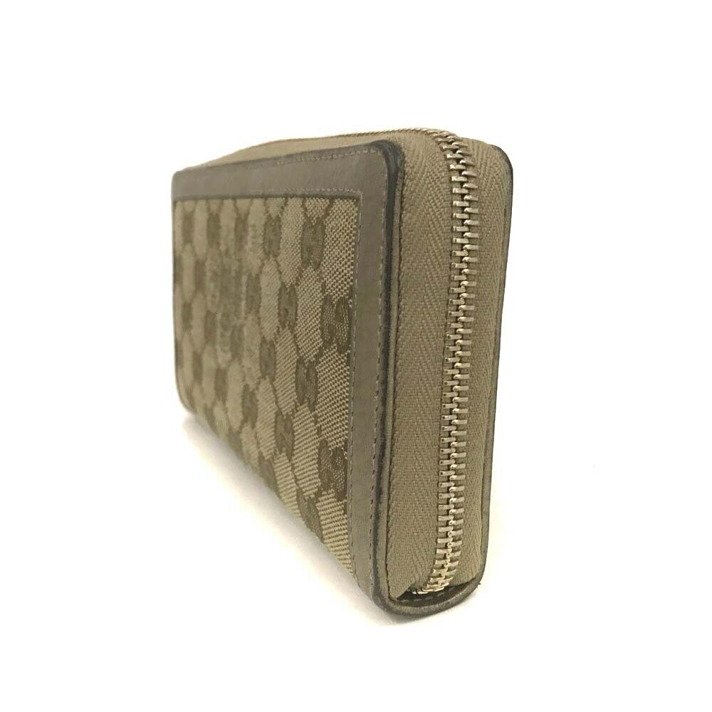 Gucci  Monogram Bamboo Tassel Zip Around Wallet Gold