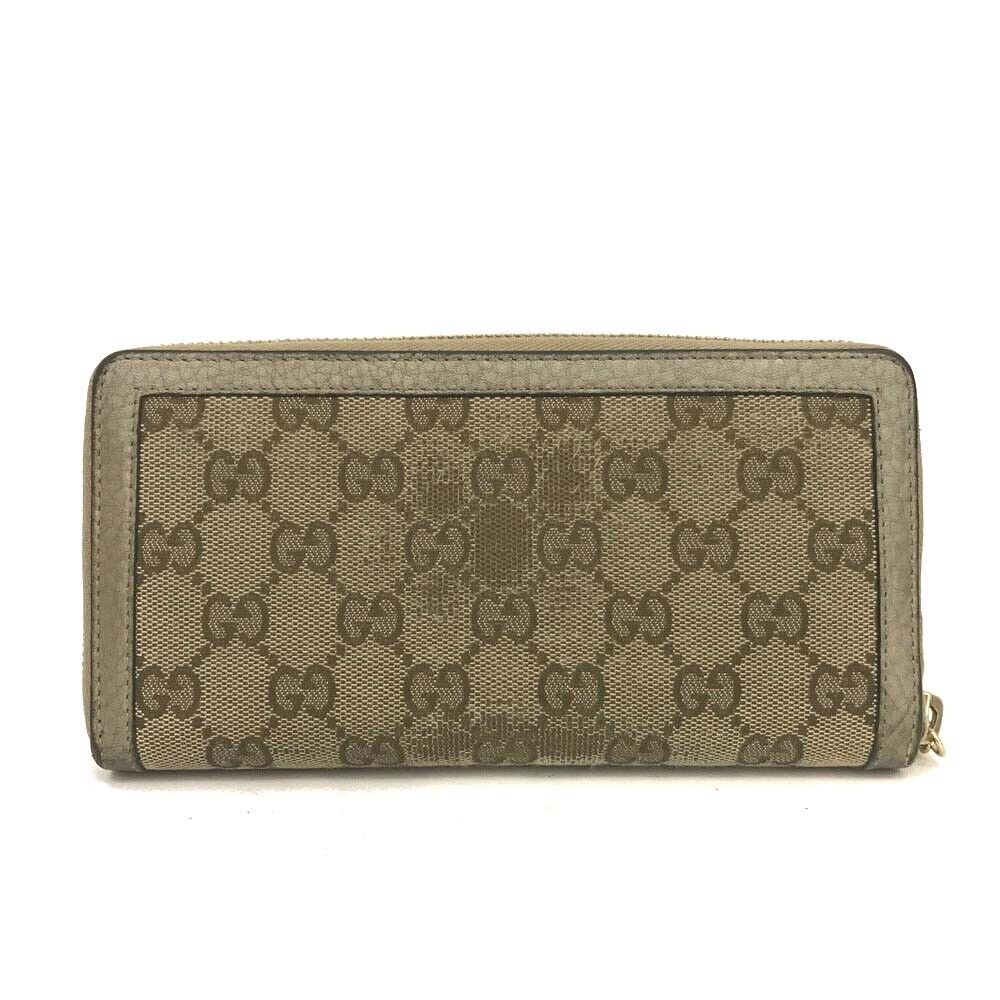 Gucci  Monogram Bamboo Tassel Zip Around Wallet Gold