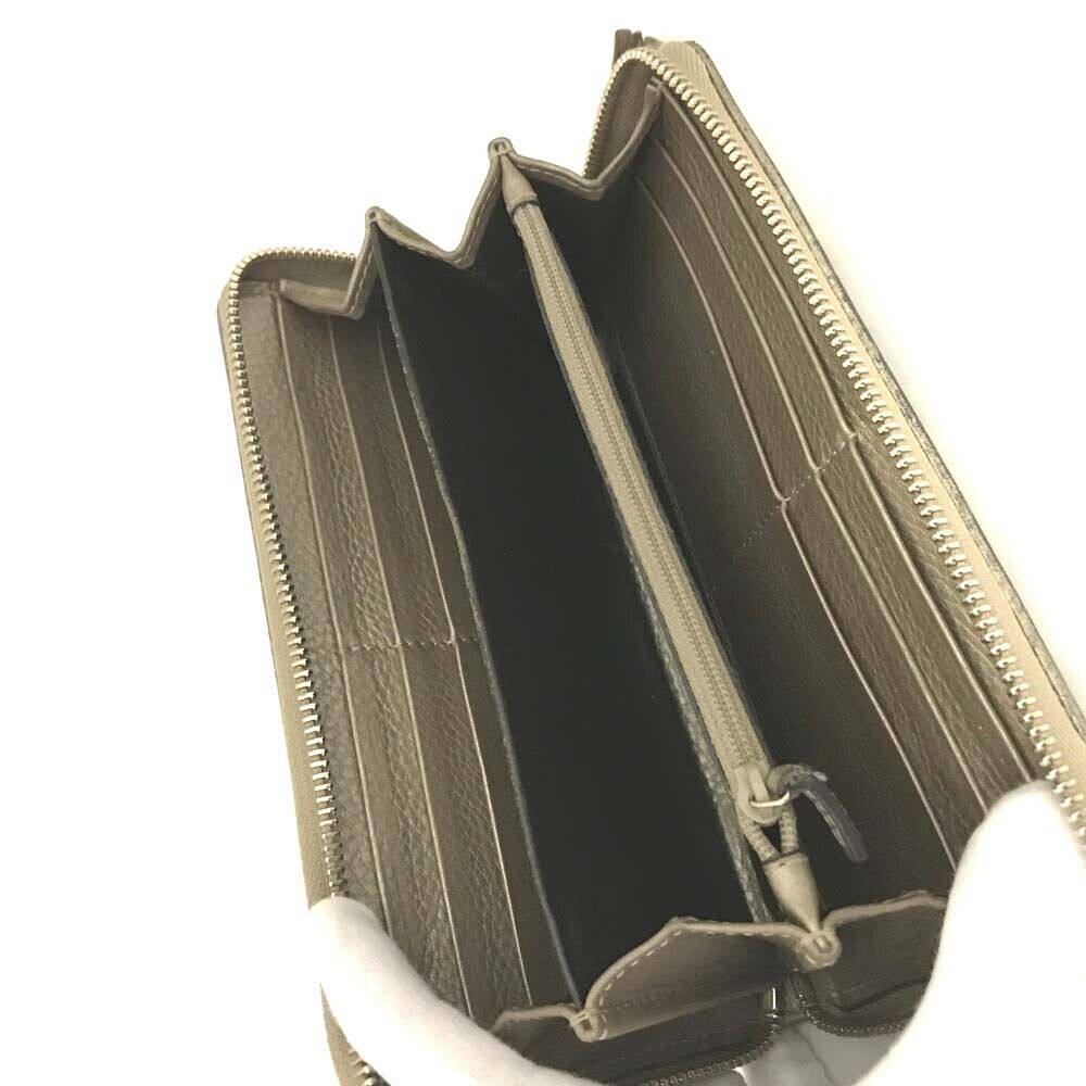 Gucci  Monogram Bamboo Tassel Zip Around Wallet Gold