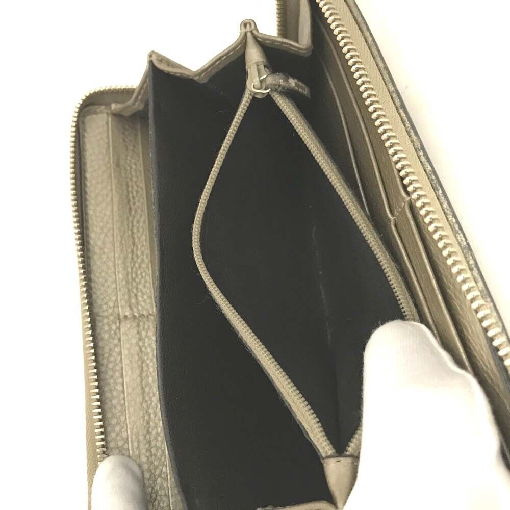 Gucci  Monogram Bamboo Tassel Zip Around Wallet Gold