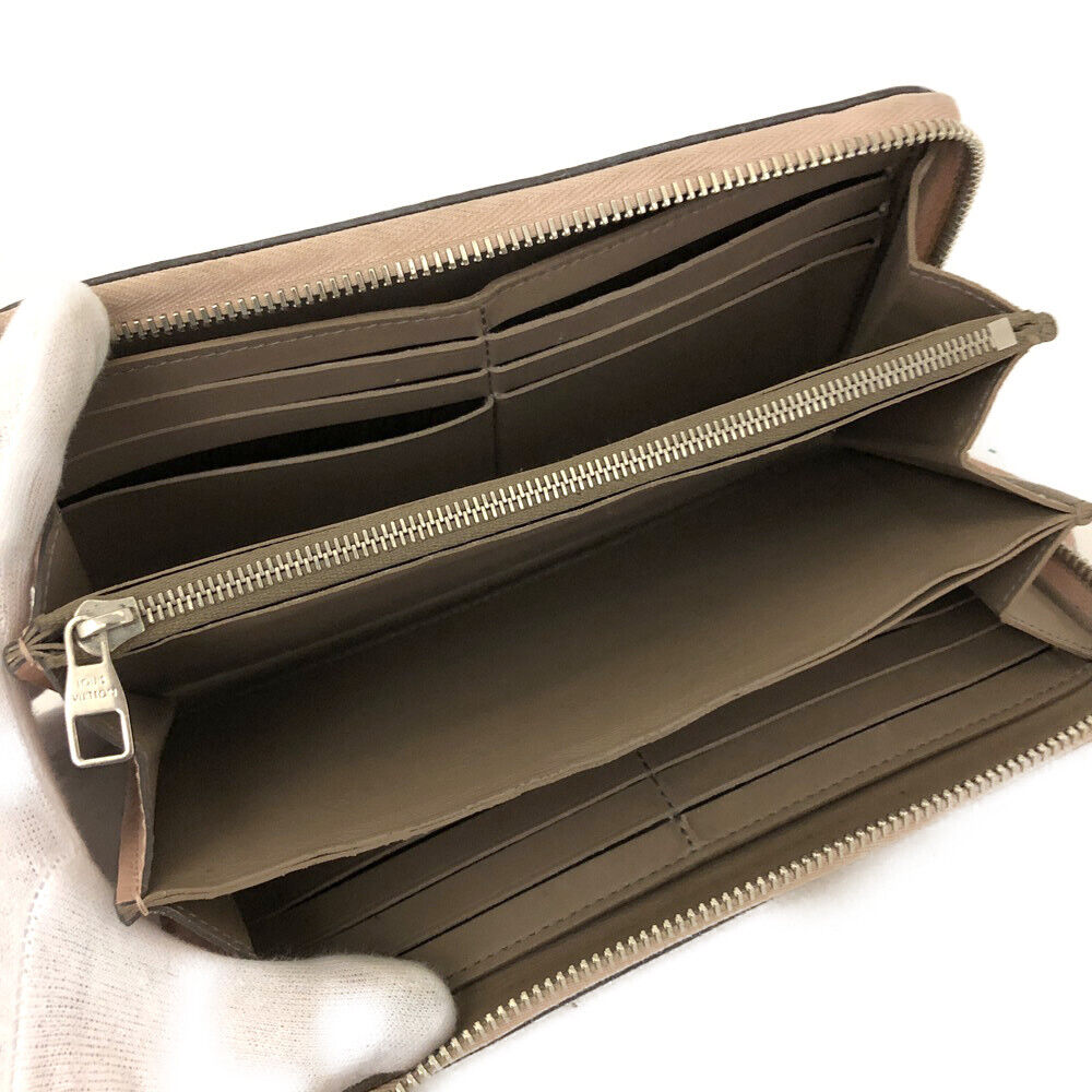 LOUIS VUITTON Parnacea Portefeuille Comet L-shaped zipper long wallet Magnolia MI2168