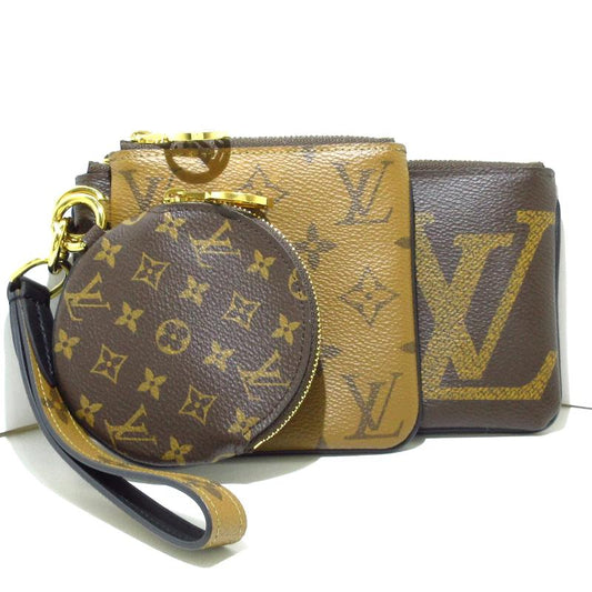 LOUIS VUITTON Reverse Monogram Giant Trio Pouch