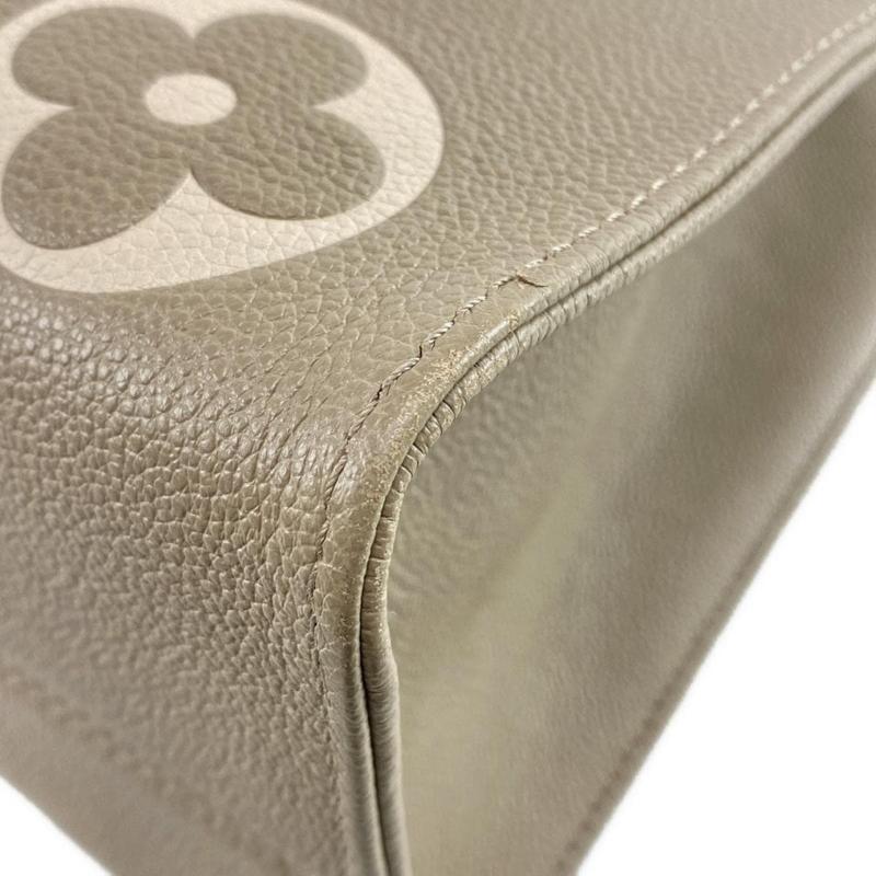 Louis Vuitton  Empreinte Monogram Giant Onthego MM Tourterelle Creme RFID