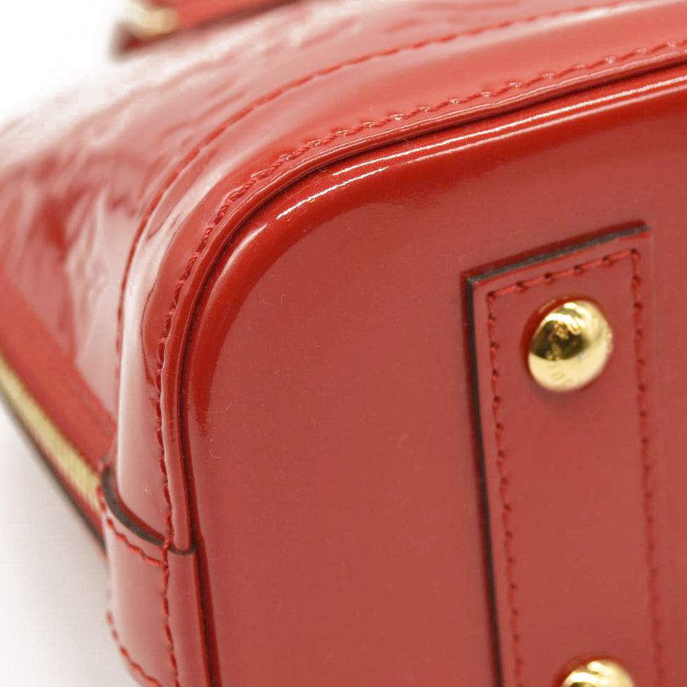 LOUIS VUITTON  Vernis Alma BB Pomme D'Amour