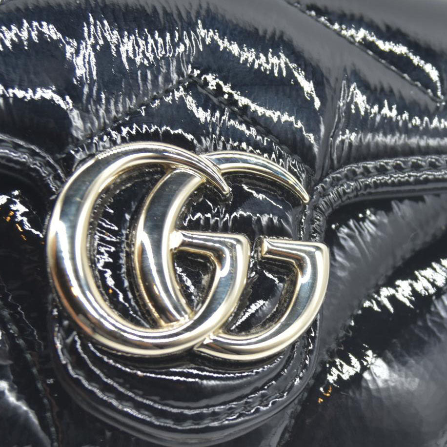 $1850 Gucci Mini Marmont quilted leather cross-body bag