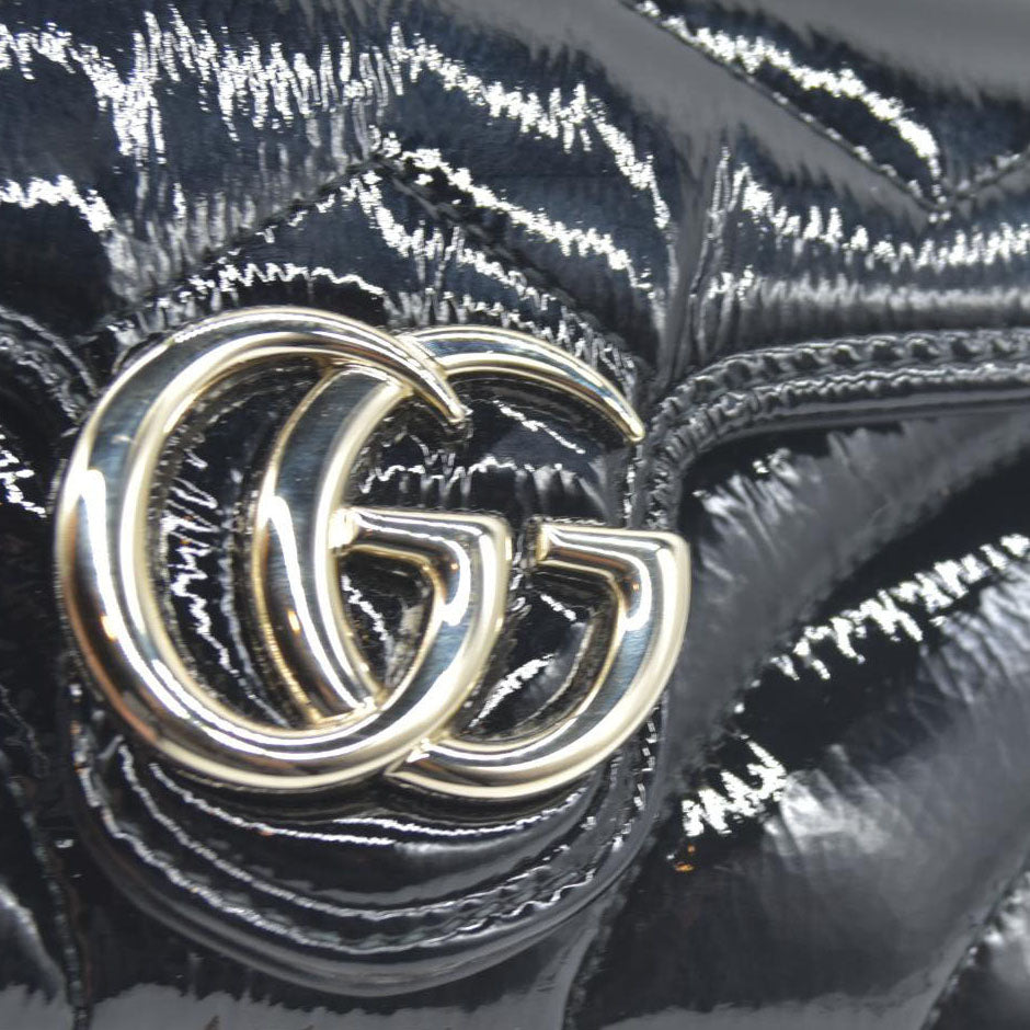 $1850 Gucci Mini Marmont quilted leather cross-body bag