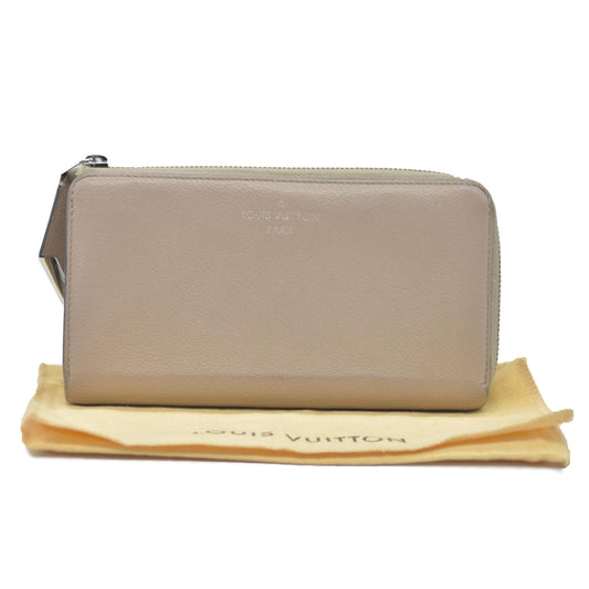 $1420 Louis Vuitton  Veau Cachemire Comete Wallet Galet MI5126