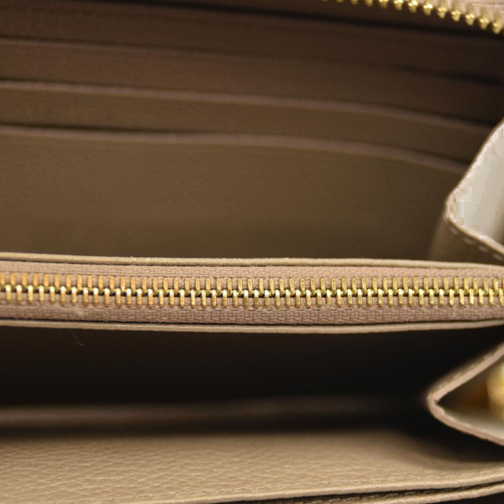 Louis Vuitton  Empreinte Monogram Giant Zippy Wallet Tourterelle Creme SP3220