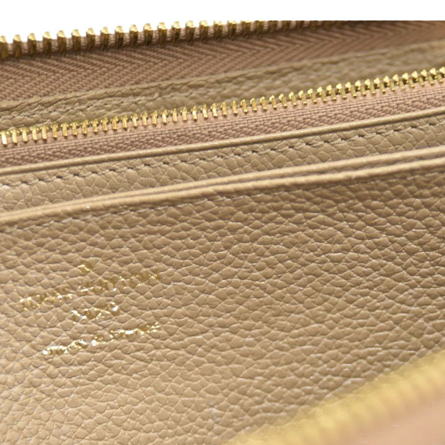 Louis Vuitton  Empreinte Monogram Giant Zippy Wallet Tourterelle Creme SP3220