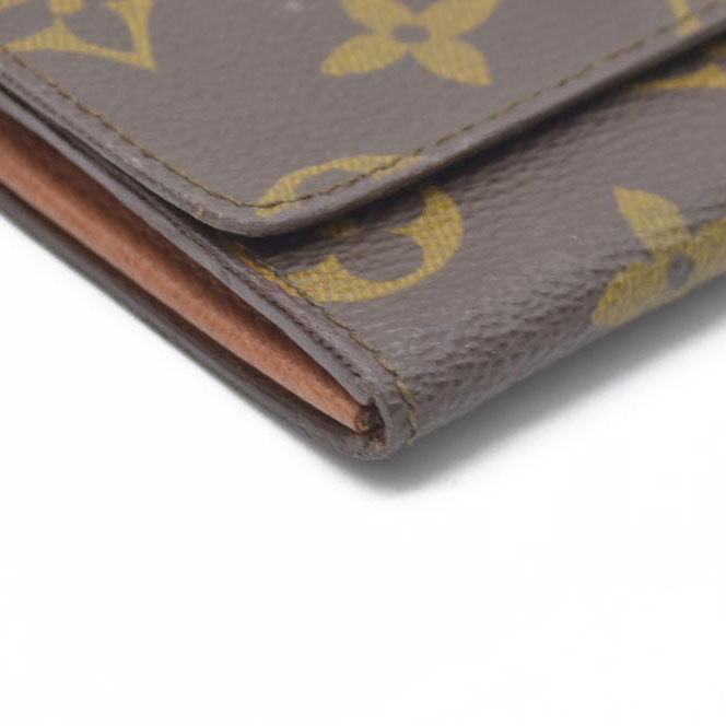 $545 Louis Vuitton  Monogram Porte-Monnaie Coin Purse RA0920