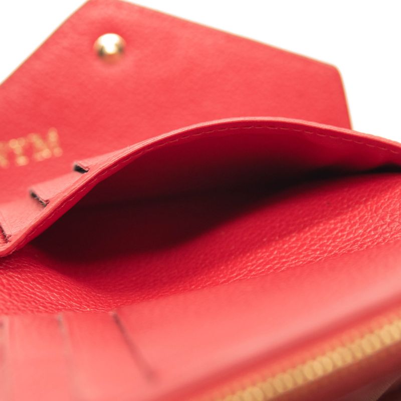 LOUIS VUITTON Empreinte Victorine Wallet in Red Pink