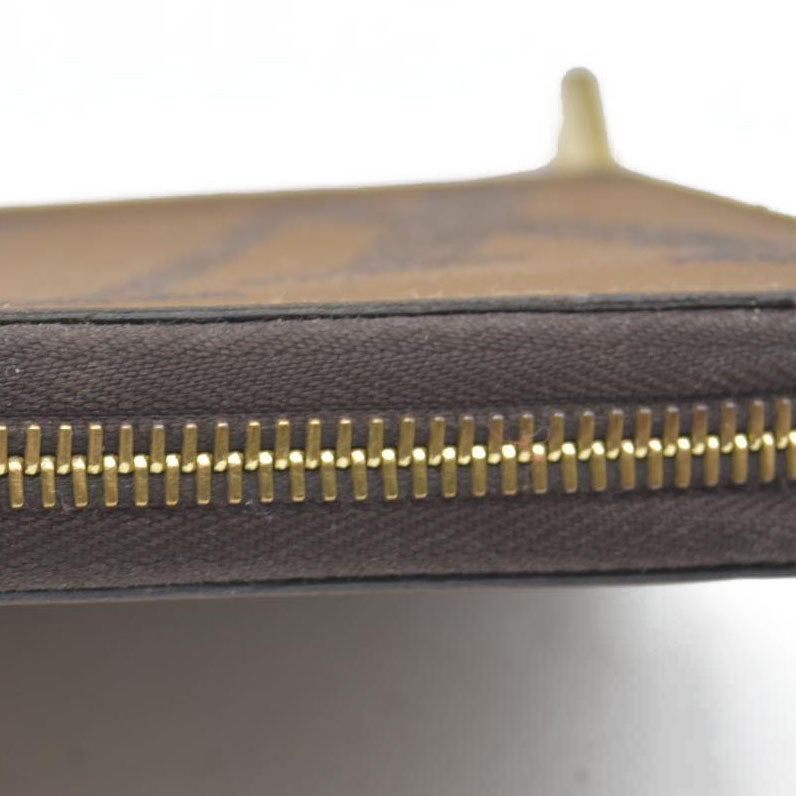 $915 CONSIGNMENT Louis Vuitton  Reverse Monogram Giant Zippy Wallet LU4220