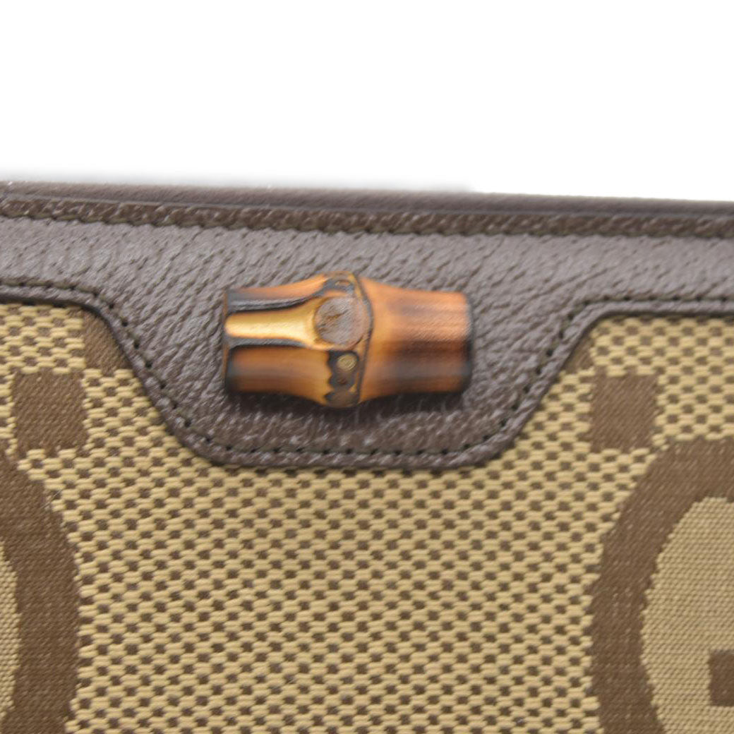 $850 CONSIGNMENT Gucci  Monogram Jumbo GG Textured Dollar Calfskin Diana Zip Around Continental Wallet Camel Ebony New Acero