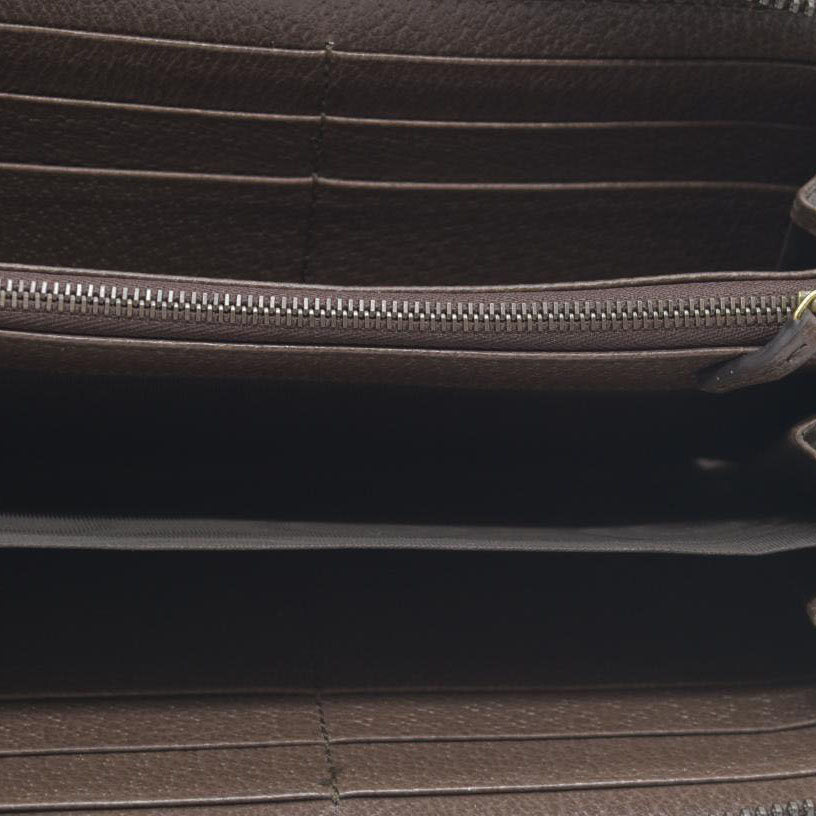 $850 CONSIGNMENT Gucci  Monogram Jumbo GG Textured Dollar Calfskin Diana Zip Around Continental Wallet Camel Ebony New Acero