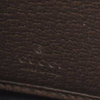 $850 CONSIGNMENT Gucci  Monogram Jumbo GG Textured Dollar Calfskin Diana Zip Around Continental Wallet Camel Ebony New Acero