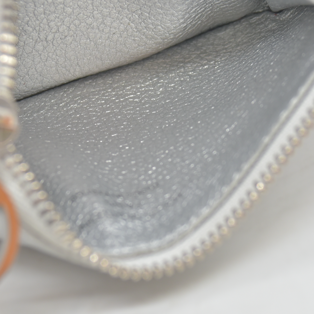 $575 RFID Louis Vuitton Monogram Empreinte Romy Card Holder Silver