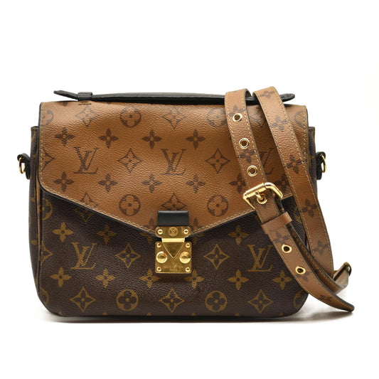 LOUIS VUITTON Pochette Métis Monogram Reverse
