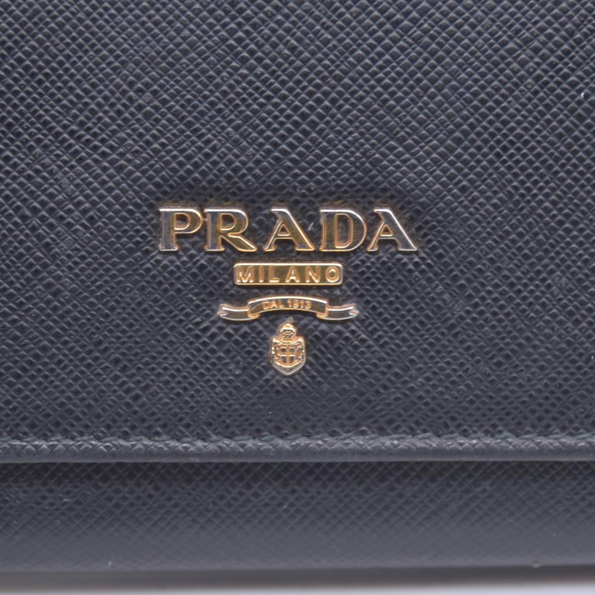 $780 PRADA Saffiano Metal Continental Flap Wallet Nero CONSIGNMENT 10021171