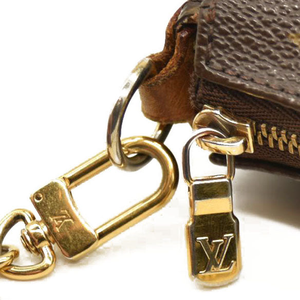 Louis Vuitton  Monogram Eva Clutch MB2154
