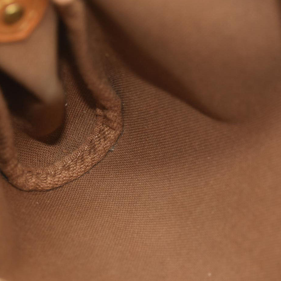 Louis Vuitton  Monogram Eva Clutch MB2154