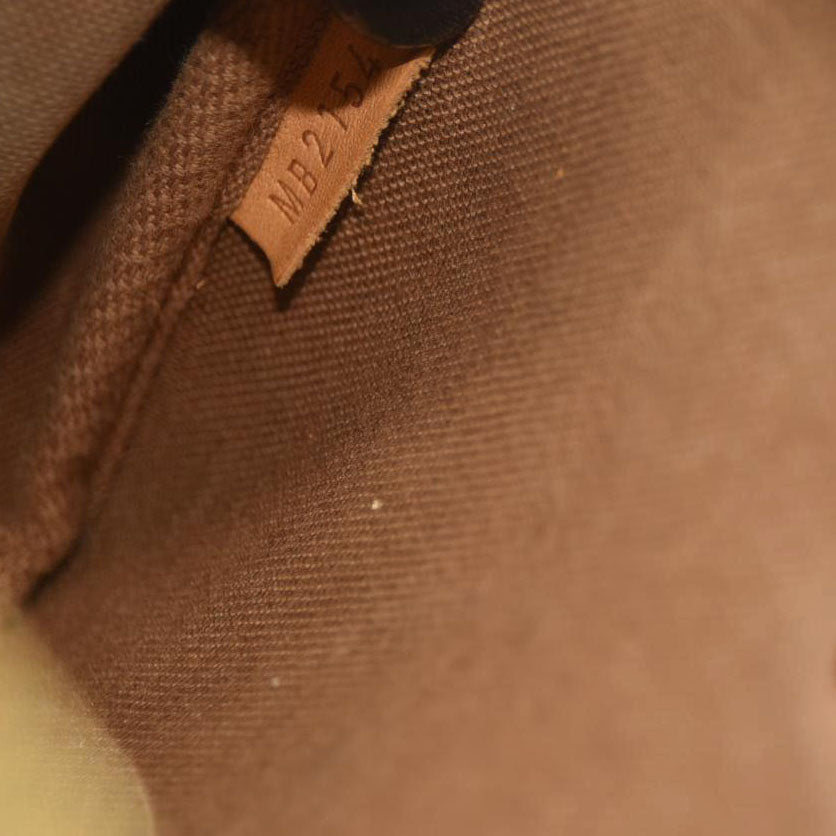 Louis Vuitton  Monogram Eva Clutch MB2154