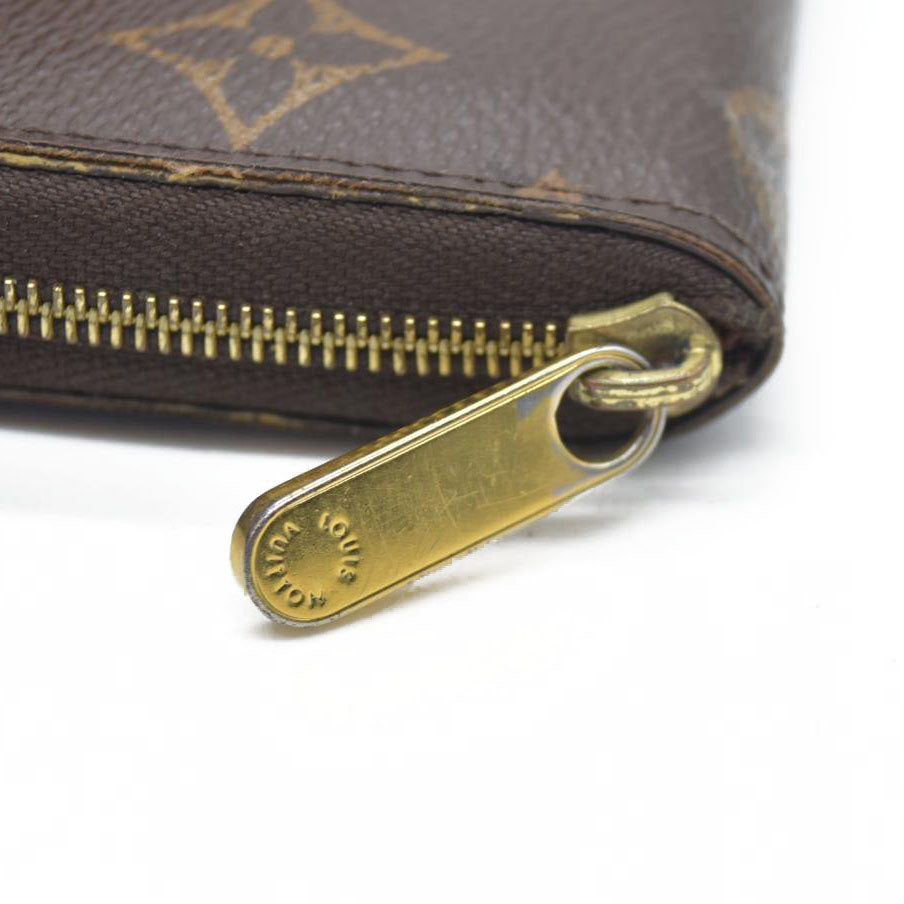 Louis Vuitton  Monogram Zippy Coin Purse $545