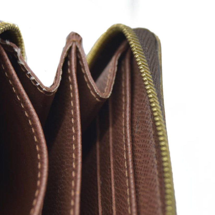 Louis Vuitton  Monogram Zippy Coin Purse $545