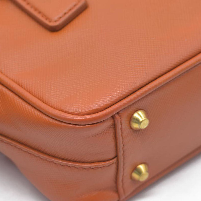 $750 Prada Saffiano Lux Mini Crossbody Bag