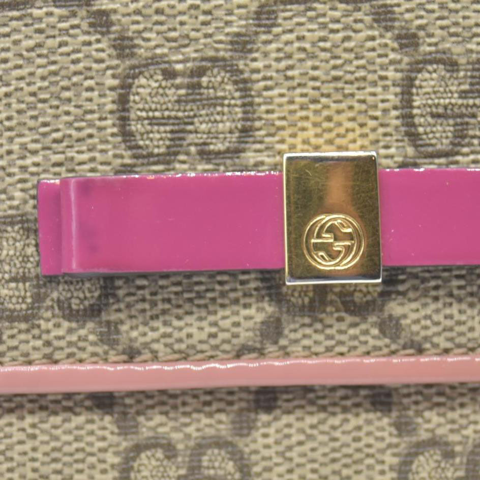 $650 Gucci pink original gg canvas continental bow wallet CONSIGNMENT