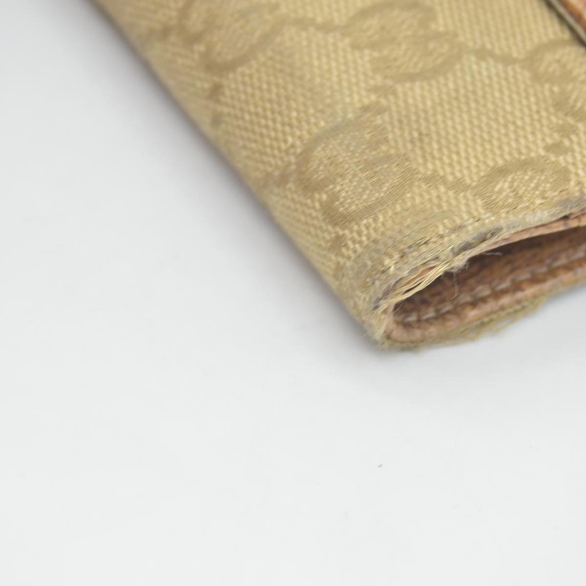 $420 Gucci Gucci Beige/Brown GG Canvas Nailhead Compact Wallet CONSIGNMENT