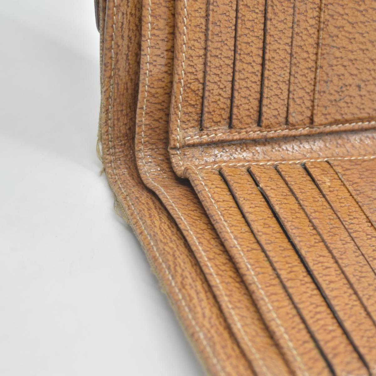 $420 Gucci Gucci Beige/Brown GG Canvas Nailhead Compact Wallet CONSIGNMENT