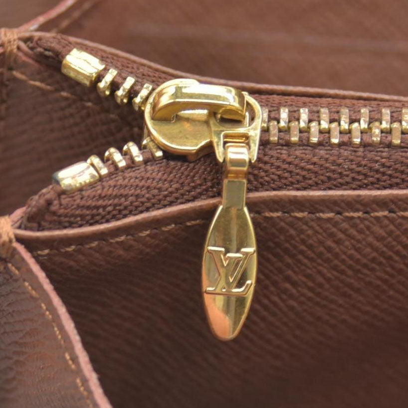 $1060 2011 Louis Vuitton Louis Vuitton Monogram Canvas Etoile Sarah Wallet CONSIGNMENT SP2131