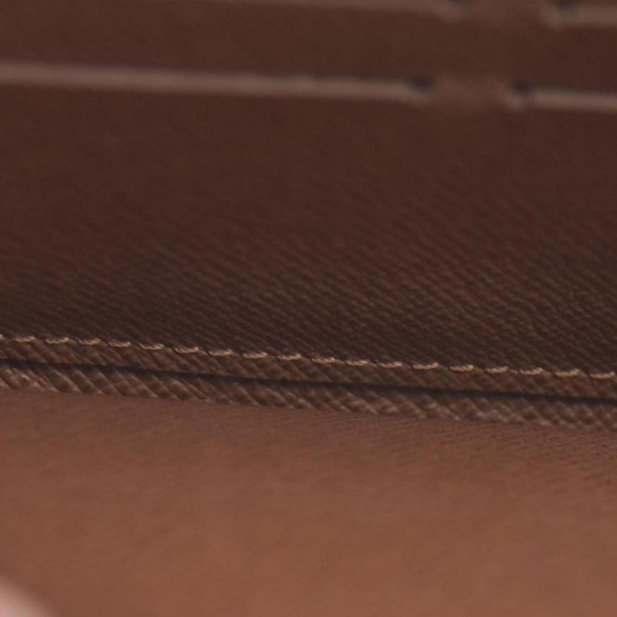 $1060 2011 Louis Vuitton Louis Vuitton Monogram Canvas Etoile Sarah Wallet CONSIGNMENT SP2131