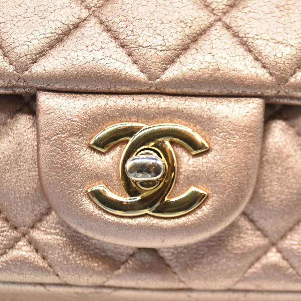 Chanel Metallic Leather Quilted Extra Mini Rectangular Flap Pink