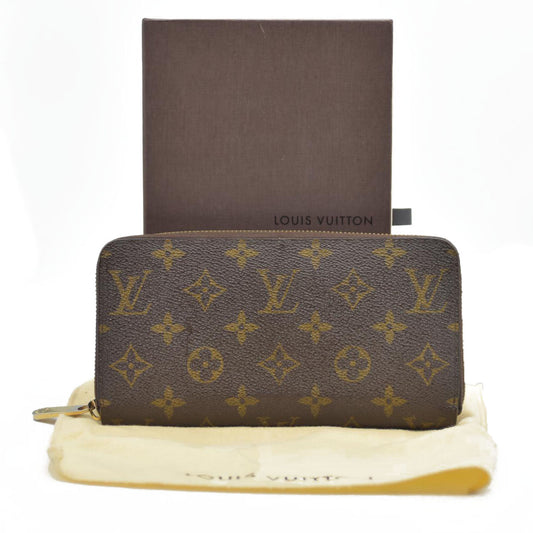AUCTION $915 Louis Vuitton Monogram Zippy Wallet