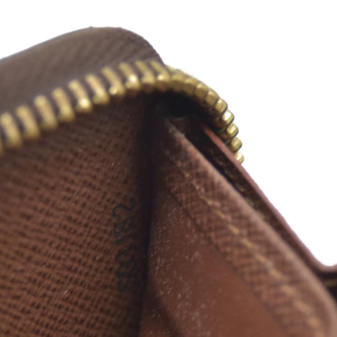 AUCTION $915 Louis Vuitton Monogram Zippy Wallet